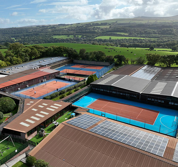 Aerial image of outdoor tennis courts.