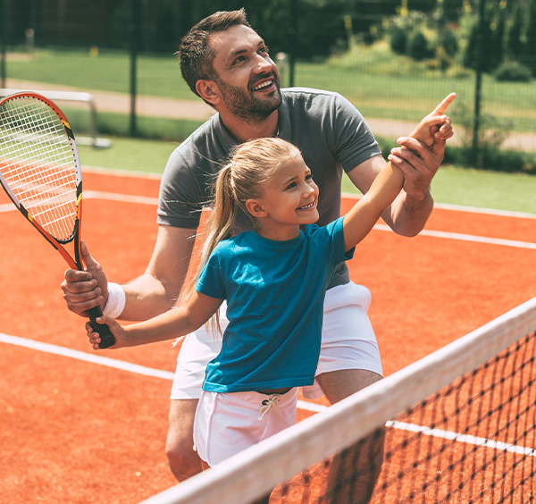 Tennis Father and Daughter playing tennis